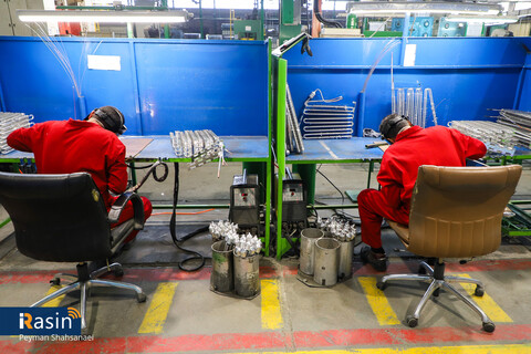 گروه صنعتی انتخاب الکترونیک- اسنوا-لوزام خانگی- کارگر-کارخانه-کارگر کارخانه